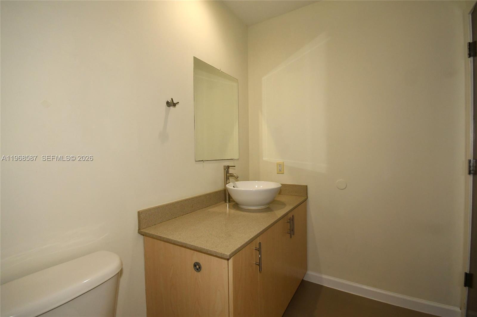 2780 Southwest 33rd Avenue Miami, FL 33133 - Photo 45 of 52 a bathroom with a sink and a vanity