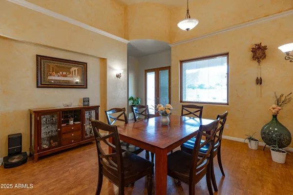 a spacious bathroom with a granite countertop sink and a mirror