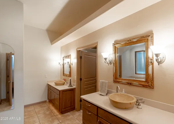 a view of a terrace with a table and chairs