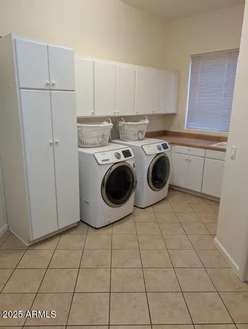a view of living room with furniture and fireplace