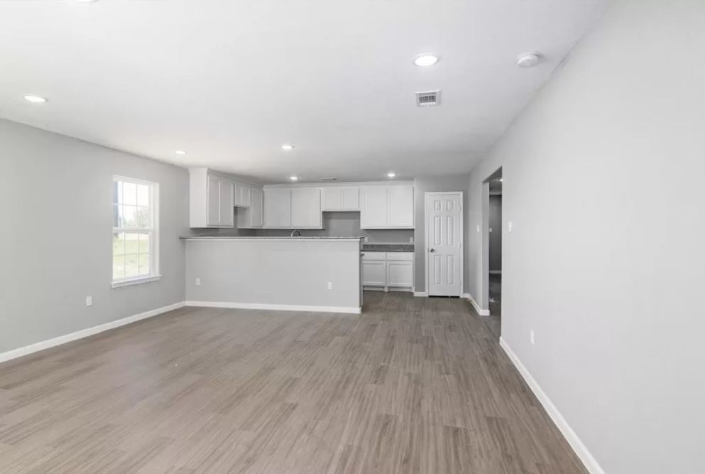 23338 Sandpiper Trail Spring, TX 77373 - Photo 4 of 11 a view of kitchen with wooden floor