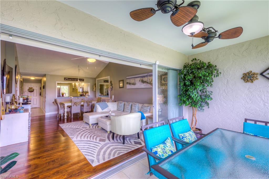 760 Augusta Boulevard, Unit D204 Naples, FL 34113 - Photo 17 of 20 a living room with furniture