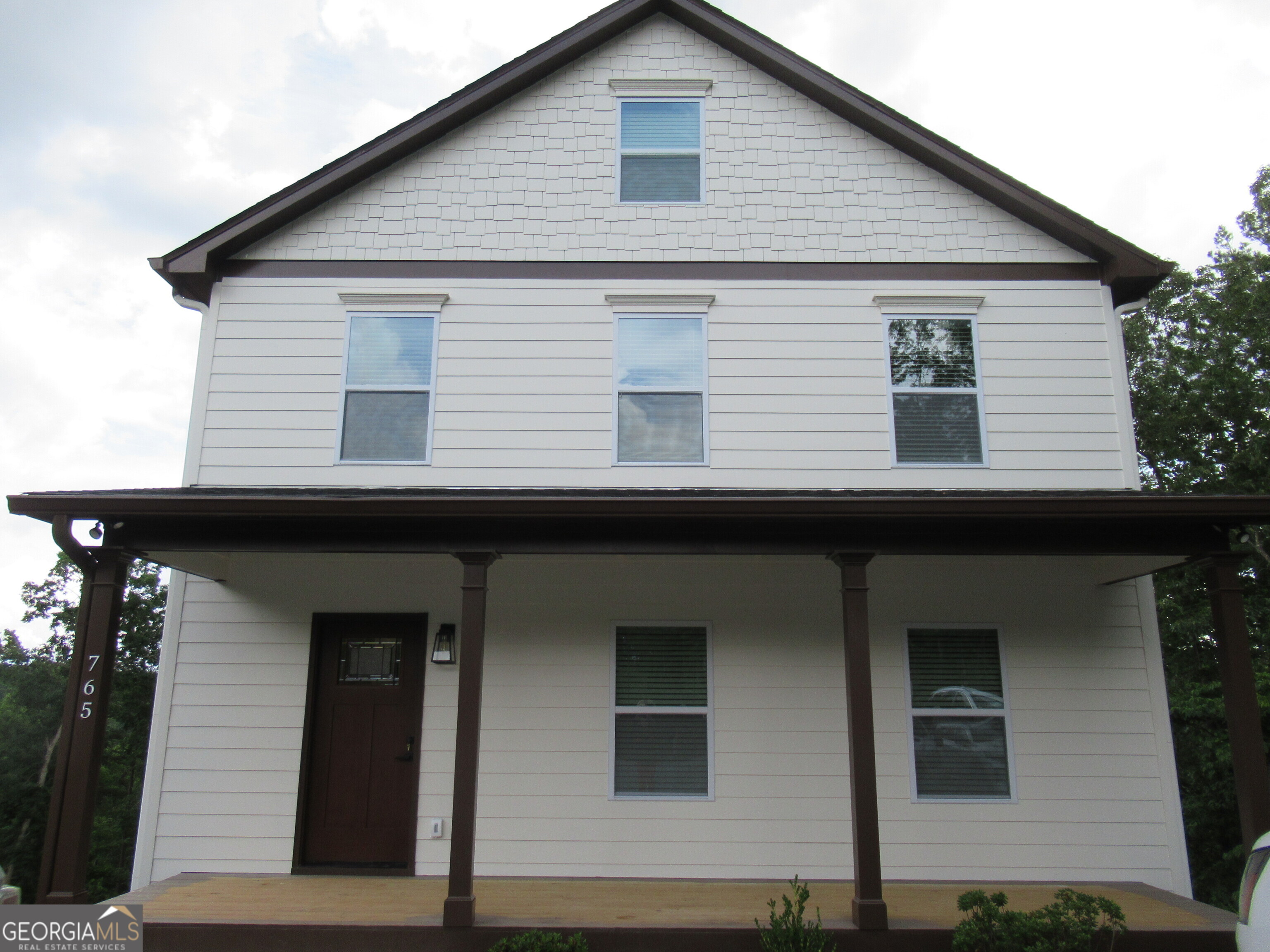 765 Old Kerns Road Dawsonville, GA 30534 - Photo 1 of 36 a front view of a house
