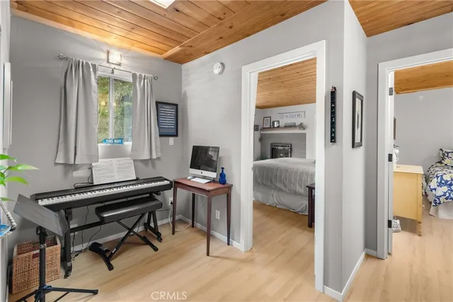 a bedroom with furniture and a window