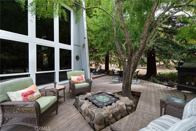 a outdoor living space with furniture and a potted plant