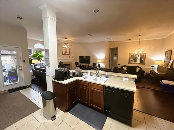 a kitchen with lots of counter top space and living room