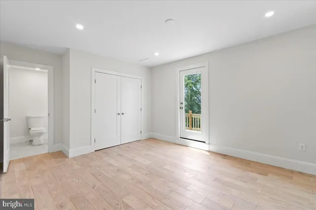 a view of livingroom with hardwood floor and a window
