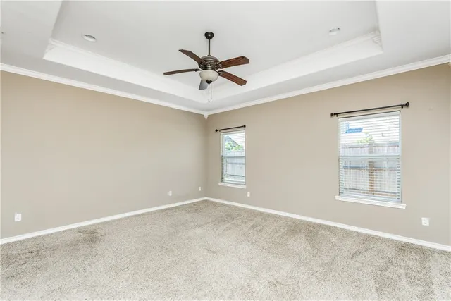 a view of room with ceiling fan