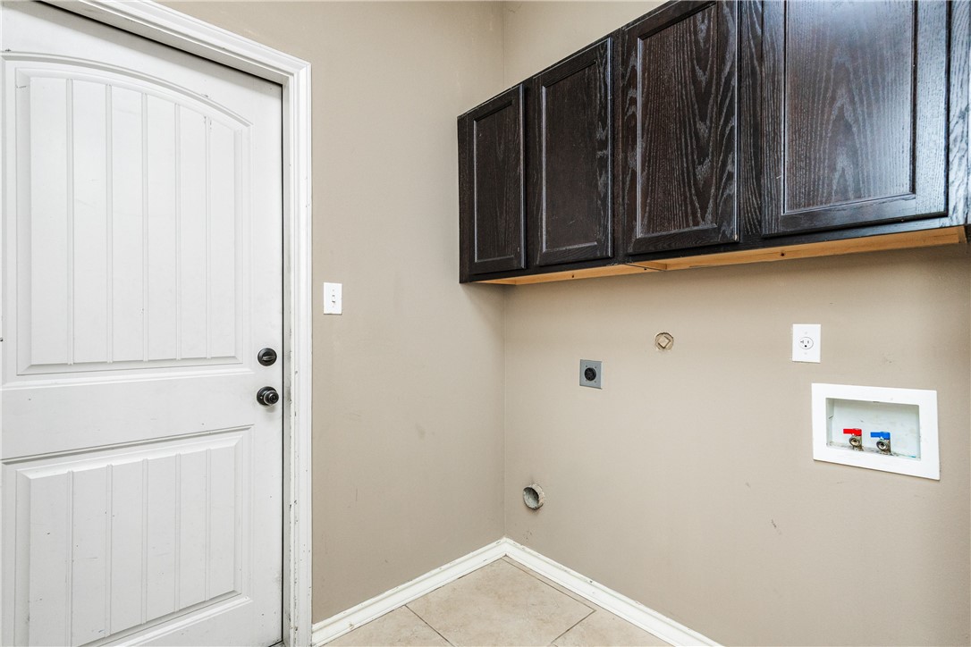 8221 Azimuth Court Corpus Christi, TX 78414 - Photo 35 of 40 a view of a closet with wooden floor