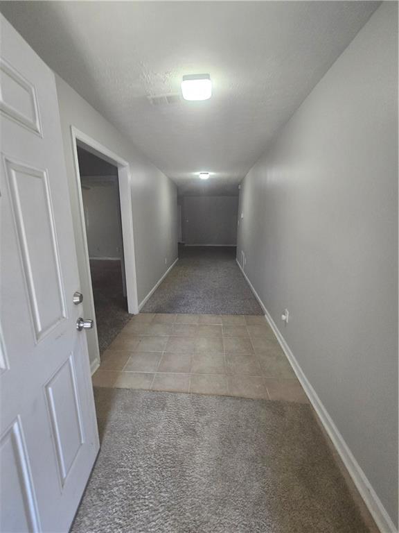 3725 Collier Drive Northwest Atlanta, GA 30331 - Photo 17 of 31 en empty room with windows