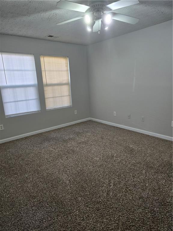 3725 Collier Drive Northwest Atlanta, GA 30331 - Photo 20 of 31 an empty room with a empty space and windows