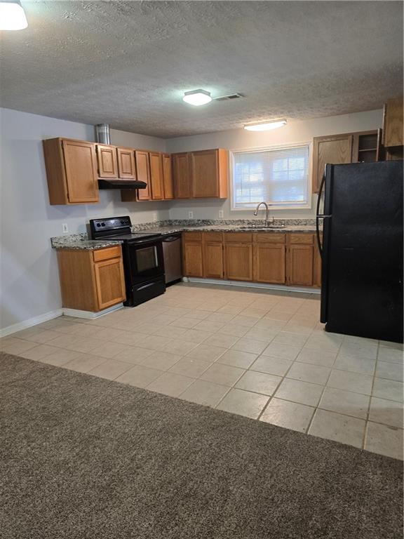 3725 Collier Drive Northwest Atlanta, GA 30331 - Photo 22 of 31 a large kitchen with stainless steel appliances granite countertop a large counter top and a stove