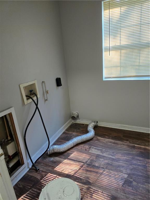3725 Collier Drive Northwest Atlanta, GA 30331 - Photo 25 of 31 a room with gym equipment and windows