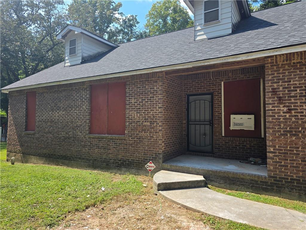 3725 Collier Drive Northwest Atlanta, GA 30331 - Photo 3 of 31 a view of a house with a yard