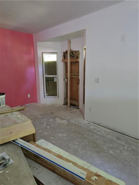 3725 Collier Drive Northwest Atlanta, GA 30331 - Photo 7 of 31 an empty room with wooden floor