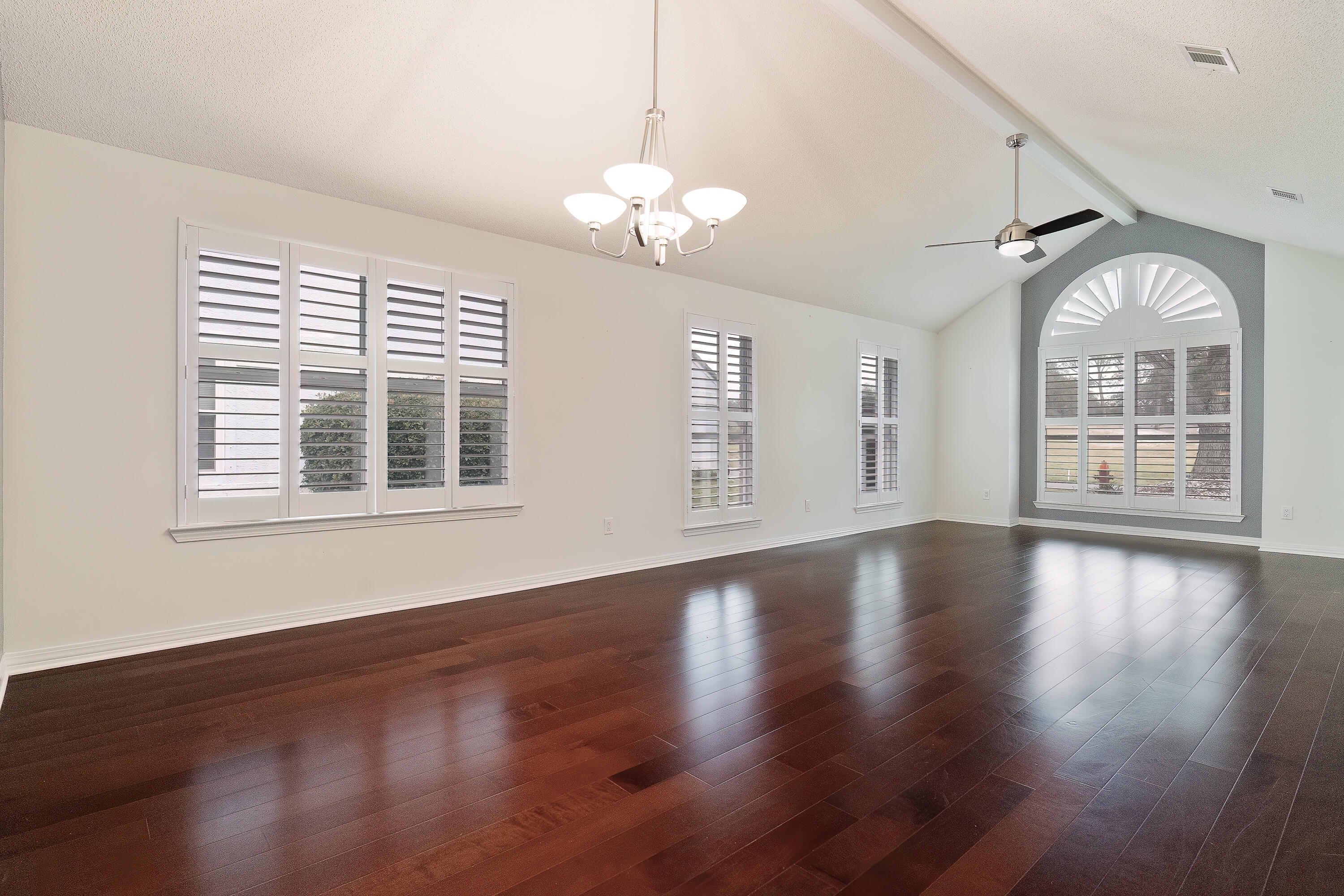 946 Shalimar Point Drive Shalimar, FL 32579 - Photo 14 of 63 a view of an empty room with wooden floor and a window