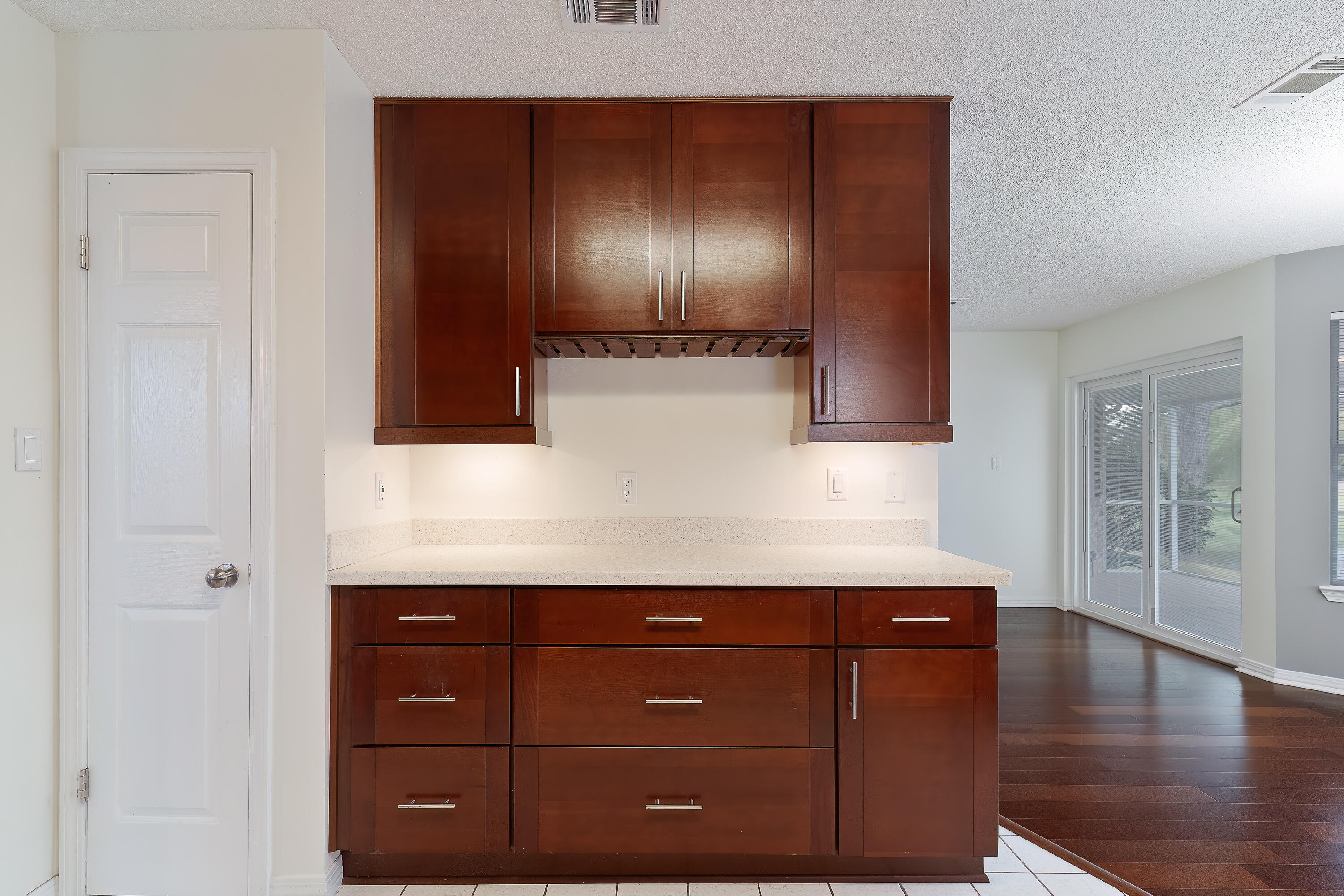 946 Shalimar Point Drive Shalimar, FL 32579 - Photo 22 of 63 a view of room with cabinets and wooden floor