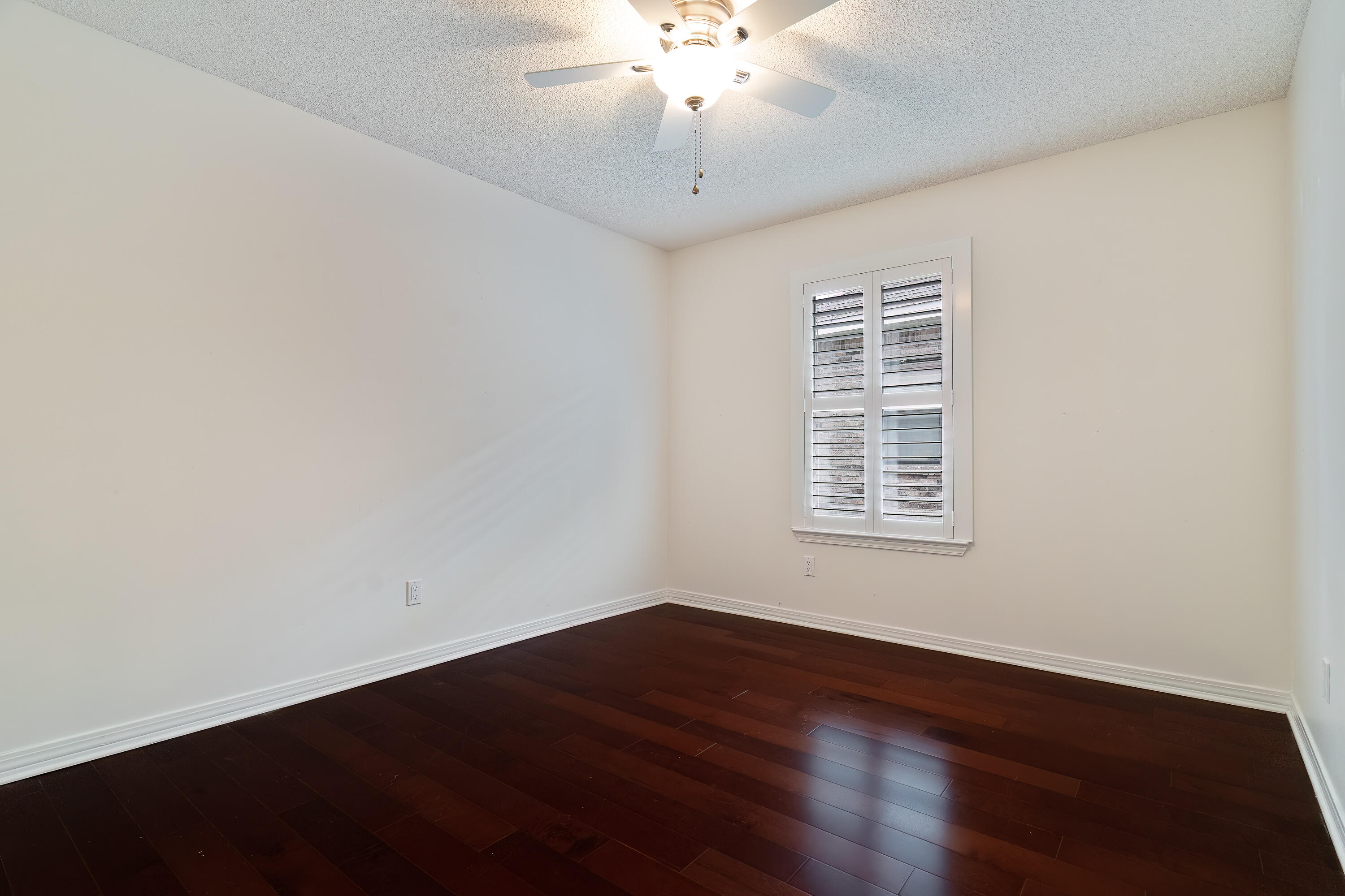 946 Shalimar Point Drive Shalimar, FL 32579 - Photo 36 of 63 an empty room with wooden floor and windows