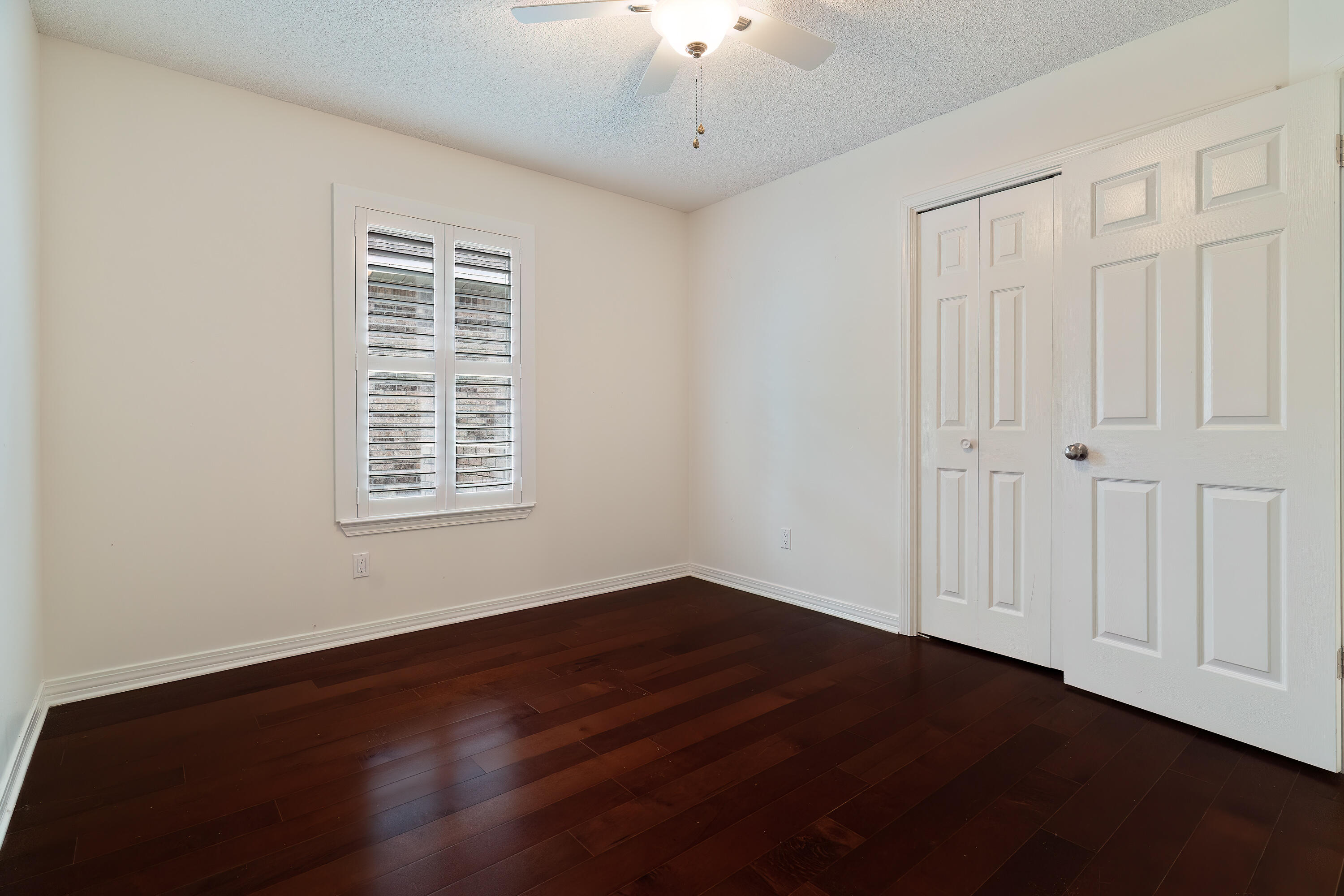 946 Shalimar Point Drive Shalimar, FL 32579 - Photo 37 of 63 wooden floor in an empty room with a window