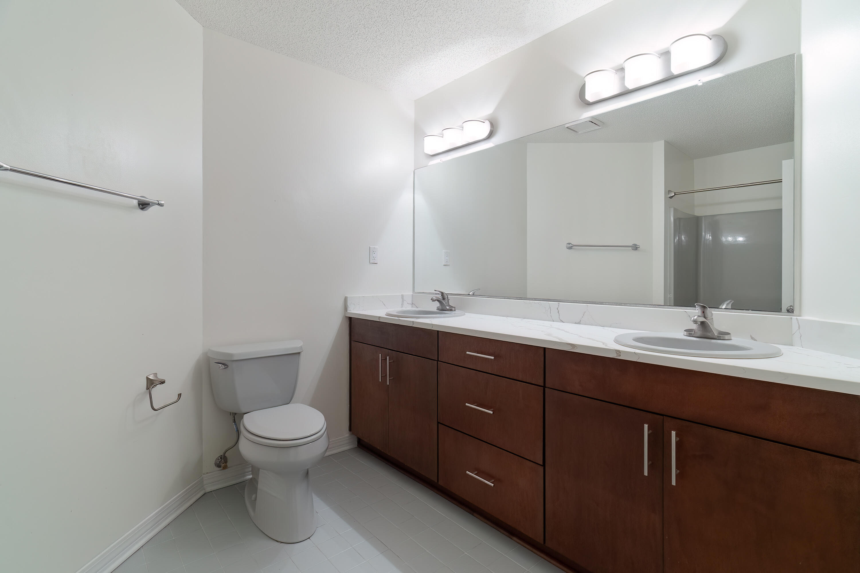 946 Shalimar Point Drive Shalimar, FL 32579 - Photo 40 of 63 a bathroom with a granite countertop toilet sink and mirror