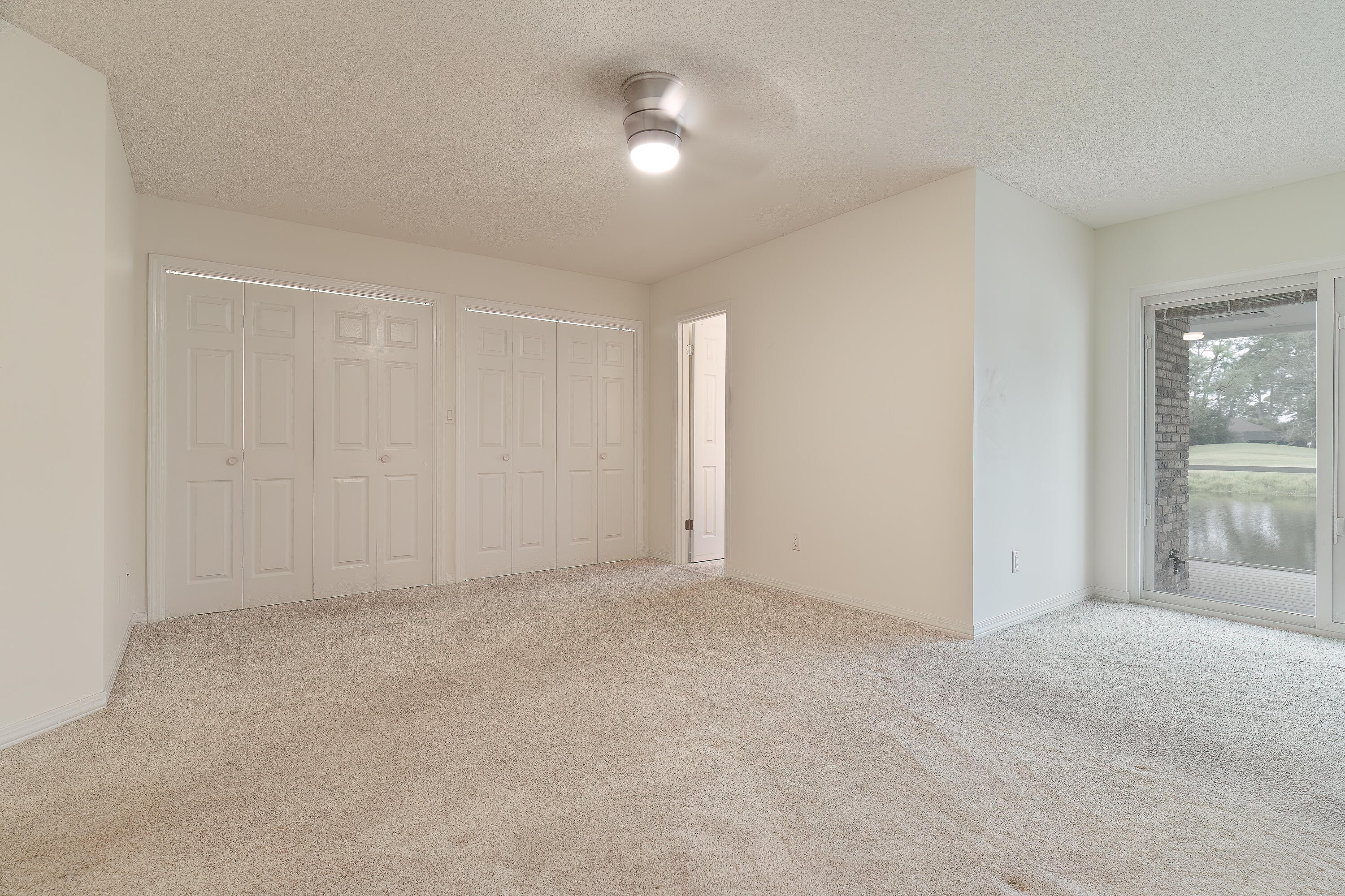 946 Shalimar Point Drive Shalimar, FL 32579 - Photo 43 of 63 a view of an empty room with a window