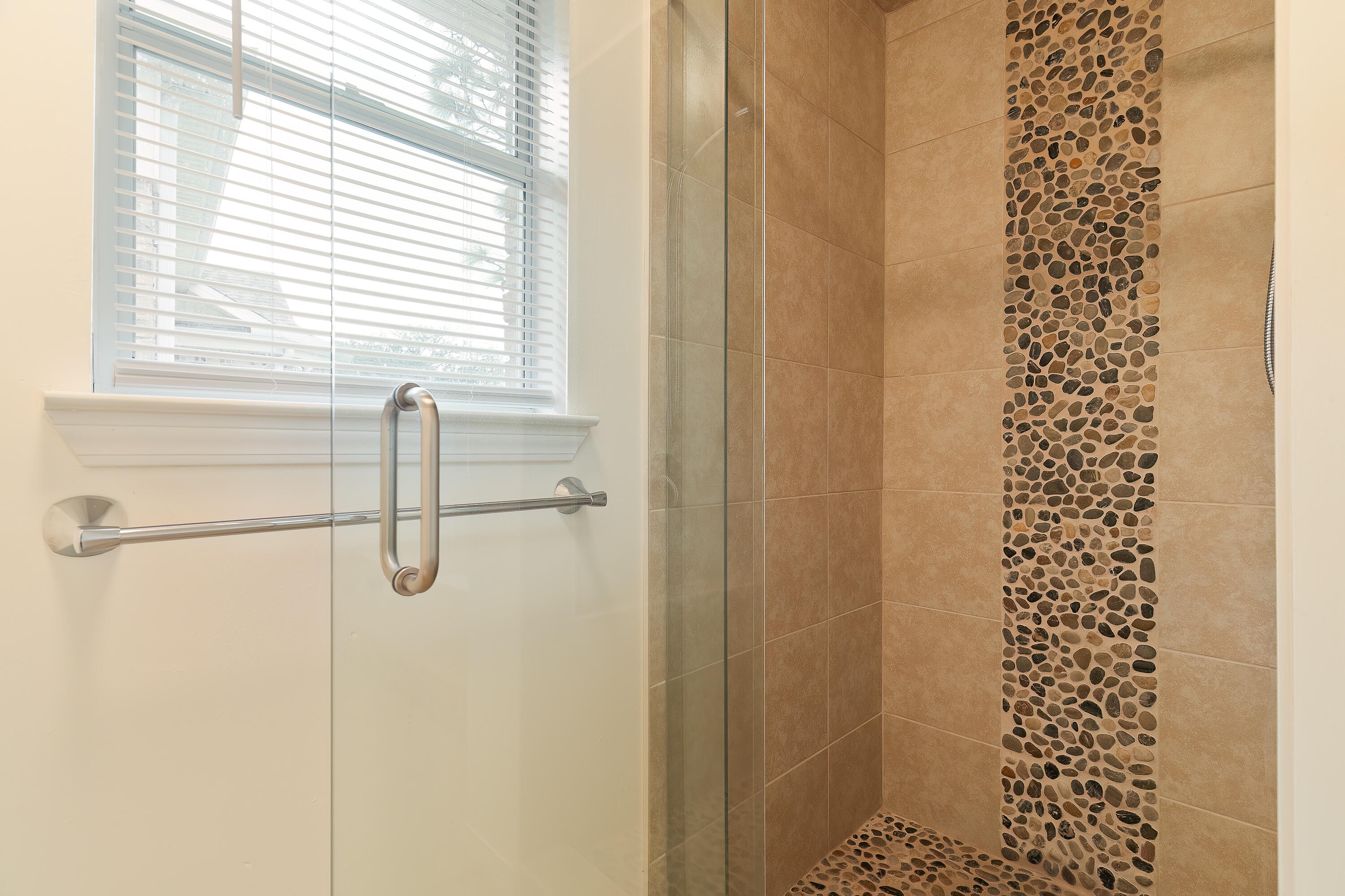 946 Shalimar Point Drive Shalimar, FL 32579 - Photo 52 of 63 a bathroom with a shower and a window