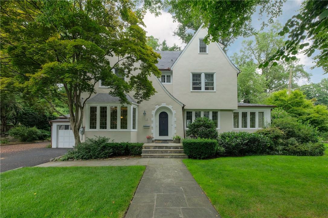 19 Hawthorne Road Bronxville, NY 10708 - Photo 1 of 1 a front view of a house with a garden