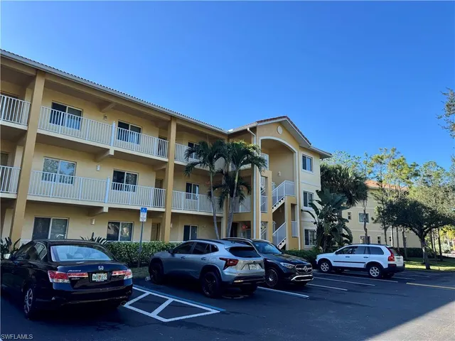 a car parked in front of a building