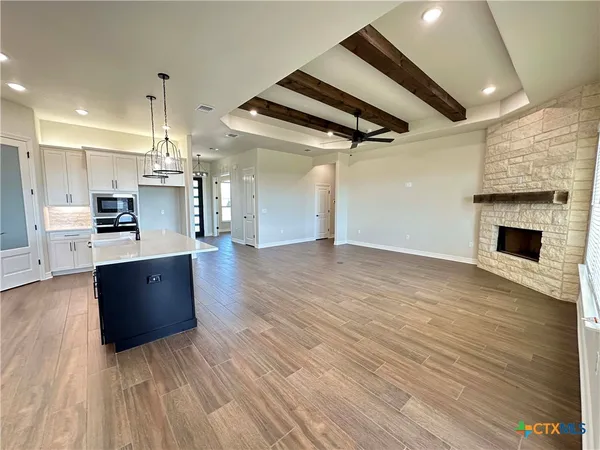 a view of kitchen and microwave