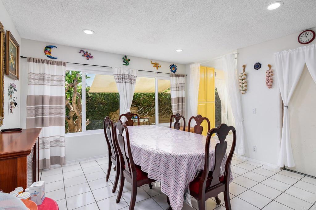 29302 Edgewood Road San Juan Capistrano, CA 92675 - Photo 13 of 57 a view of a dining room with furniture window and outside view