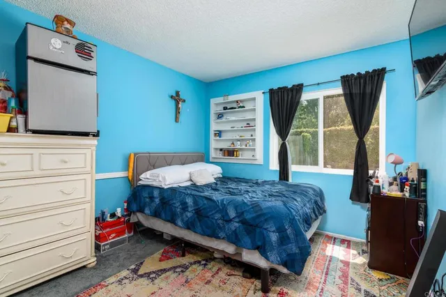 a view of swimming pool with seating area