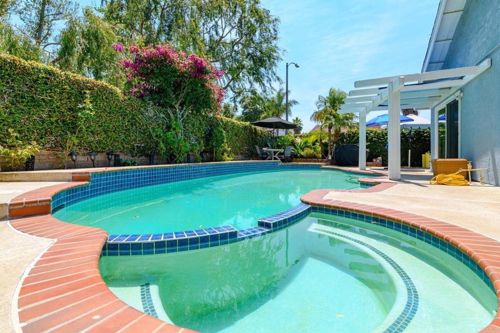 29302 Edgewood Road San Juan Capistrano, CA 92675 - Photo 28 of 57 a swimming pool with outdoor seating and yard