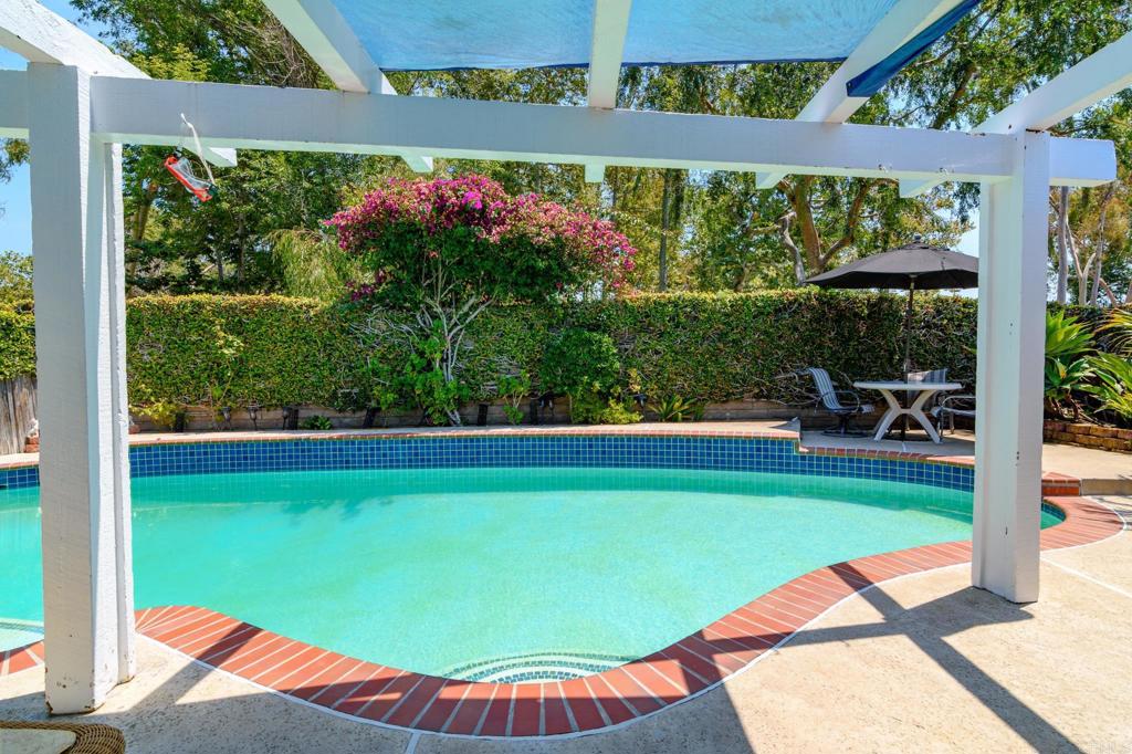 29302 Edgewood Road San Juan Capistrano, CA 92675 - Photo 30 of 57 a view of a swimming pool with an outdoor seating
