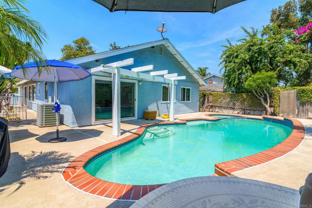 29302 Edgewood Road San Juan Capistrano, CA 92675 - Photo 32 of 57 a view of a house with pool and chairs
