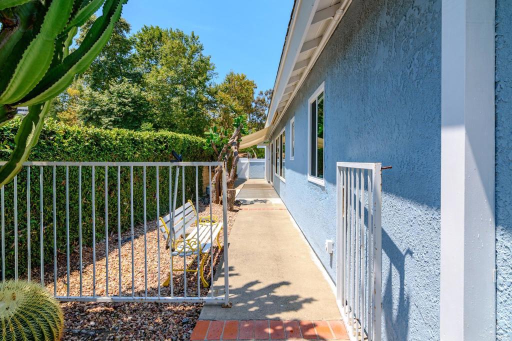 29302 Edgewood Road San Juan Capistrano, CA 92675 - Photo 33 of 57 a view of balcony with wooden floor and fence
