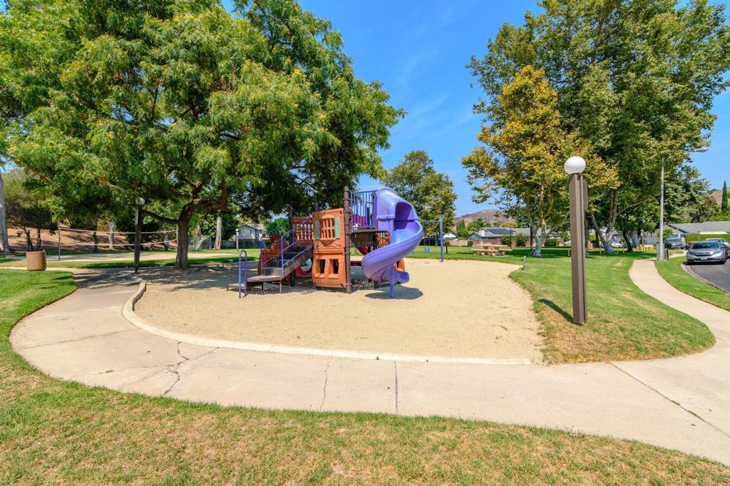 29302 Edgewood Road San Juan Capistrano, CA 92675 - Photo 48 of 57 a view of a swimming pool with a patio