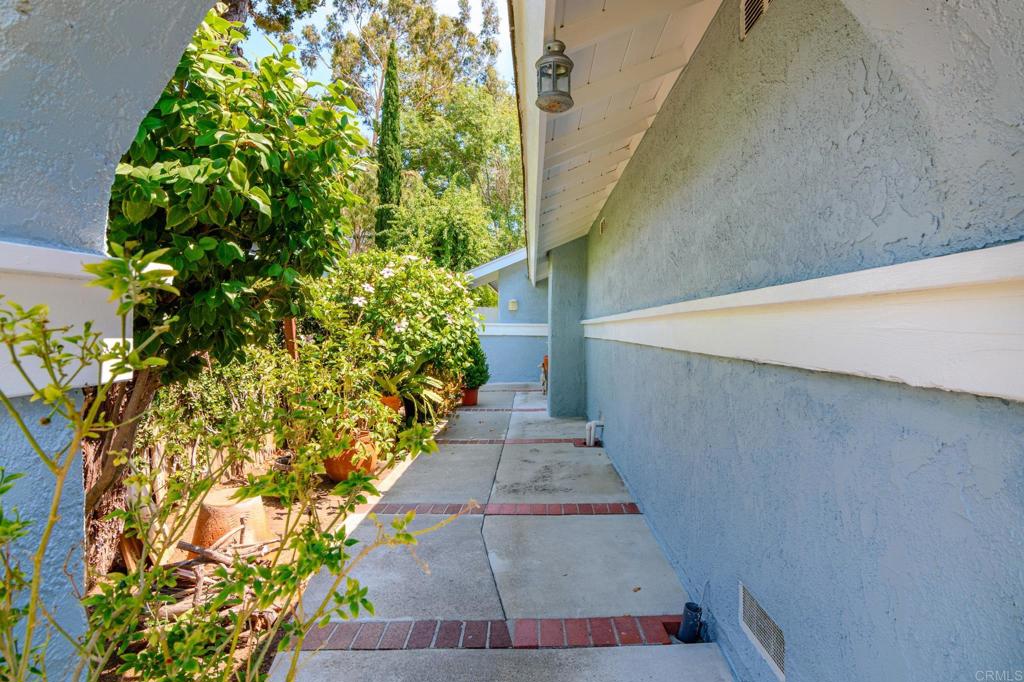 29302 Edgewood Road San Juan Capistrano, CA 92675 - Photo 5 of 57 a view of entryway with flower plants