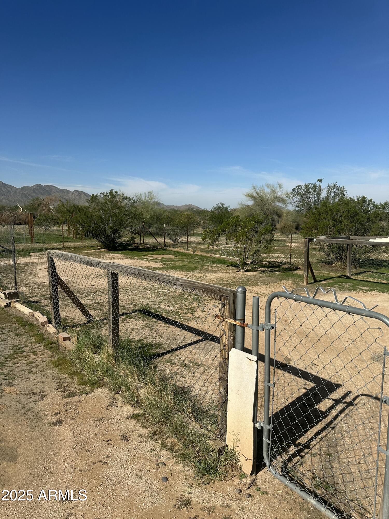 840 North Falton Road Maricopa, AZ 85139 - Photo 22 of 28 a view of a lake with a mountain