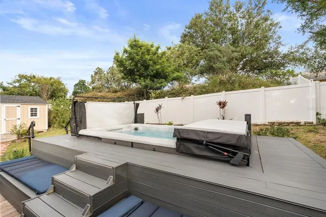 swimming pool view with seating space