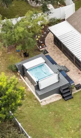 a view of a pool with a yard