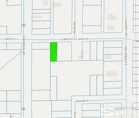 a view of a kitchen with white wall and white walls