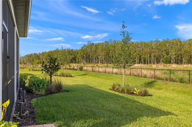 a view of an outdoor space and a yard