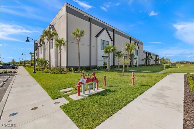 a childrens park with lots of swings and slides