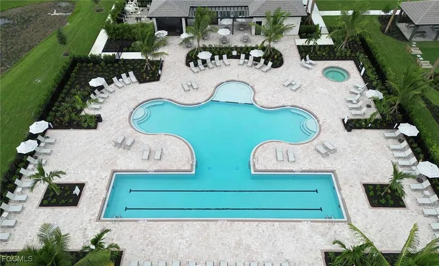 an aerial view of a house with wooden floor