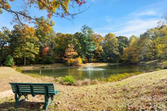 a view of a house with pool table and chairs