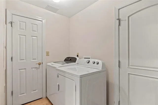 a house with a flower garden in front of it