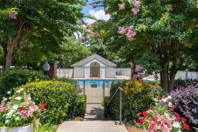 a view of swimming pool with lounge chair
