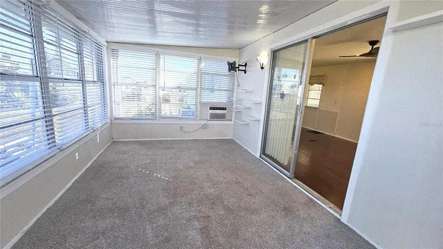 a view of empty room with large window