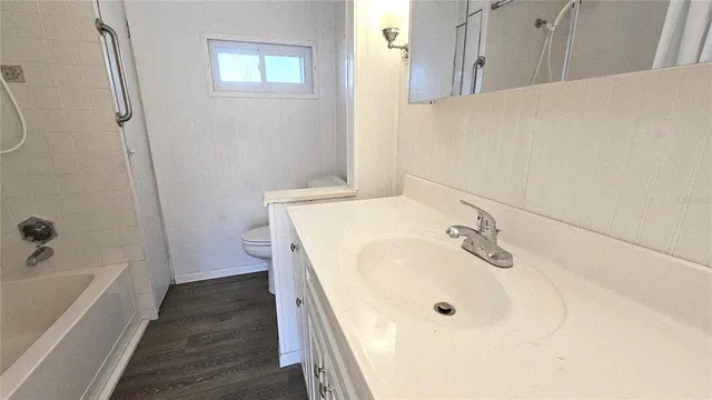 a bathroom with a sink and a tub