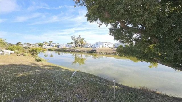 a view of a lake with houses